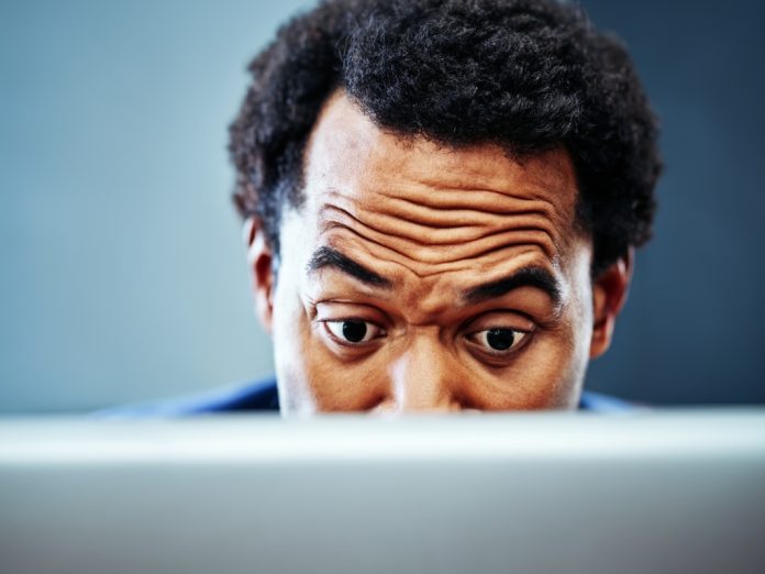 Frustrated user looking at Bing Image Creator on a computer screen