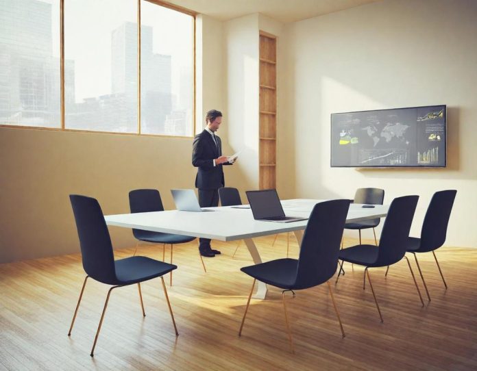 Team of professionals engaged in collaborative work discussion in modern office environment