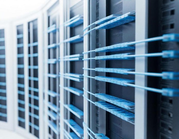 Fiber optic cable installation in data center infrastructure supporting artificial intelligence systems