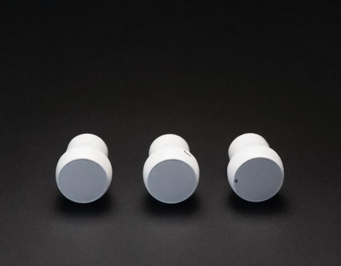 Comparison of budget and premium wireless earbuds on display highlighting price difference and similar features